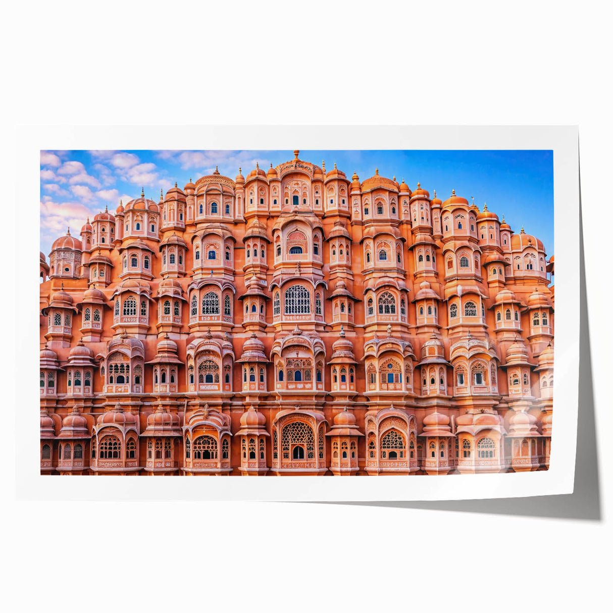 Extra large rolled print of a serene Indian landscape with lush floral elements in vibrant green and blue tones.