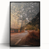 Large abstract wall art depicting fall themes in earthy tones on a black framed acrylic.