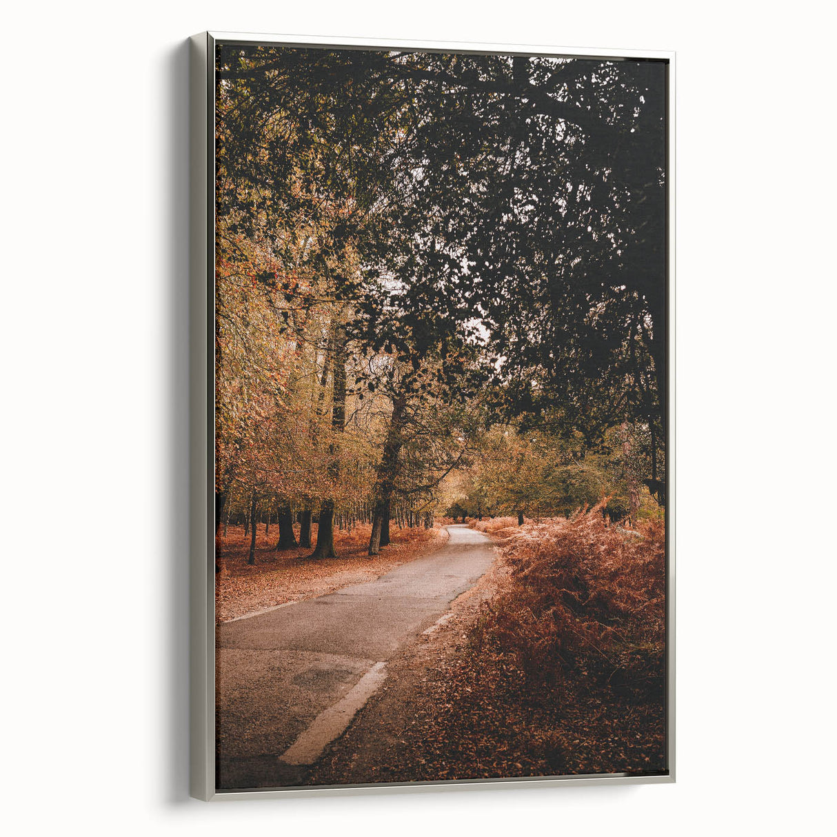 Framed canvas depicting a vintage-style landscape with autumnal trees in vibrant colors, ideal for living room decor.