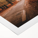 Art deco poster of an autumnal scene with orange and brown hues on rolled canvas, suitable for dining room wall art.