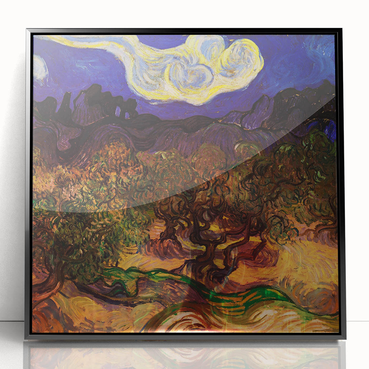 Large abstract wall art featuring swirling blue and yellow patterns on a black framed acrylic.