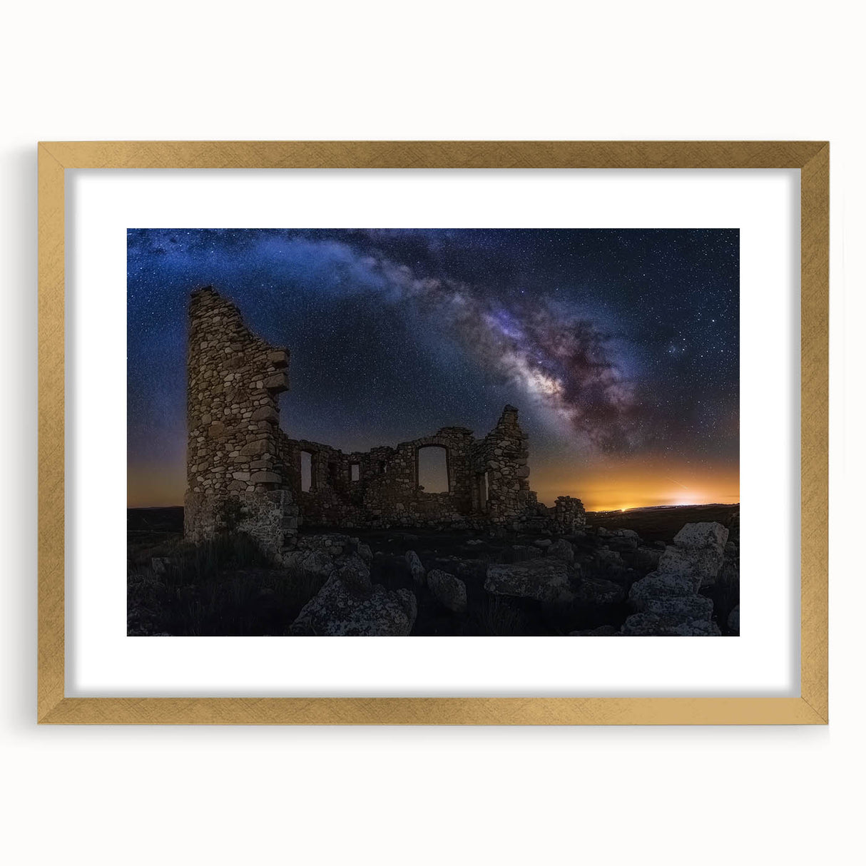 Elegant gold-framed landscape artwork featuring a majestic castle surrounded by lush greenery, showcasing intricate details and a classic mat finish, perfect for home decor.