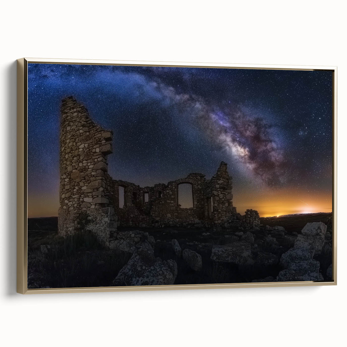 Framed canvas artwork depicting a vibrant landscape with a majestic castle, accentuated by a gold frame, showcasing intricate details and rich colors. Perfect for home decor, this piece adds elegance to any room setting.