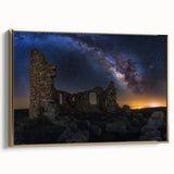 Framed canvas artwork depicting a vibrant landscape with a majestic castle, accentuated by a gold frame, showcasing intricate details and rich colors. Perfect for home decor, this piece adds elegance to any room setting.