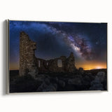 Framed canvas artwork showcasing a picturesque landscape with a majestic castle, elegantly bordered in silver. The piece captures vibrant colors and intricate details, perfect for enhancing home decor.