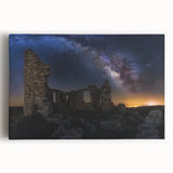 Stretched canvas artwork depicting a vibrant landscape with a majestic castle surrounded by lush greenery and a clear blue sky, perfect for home decor.