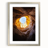 Framed silver landscape artwork showcasing a cave scene, featuring intricate details and a stylish mat for enhanced presentation, ideal for home decor.
