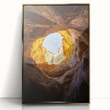Framed acrylic artwork depicting a stunning cave landscape, featuring rich gold accents and intricate details. Perfect for enhancing contemporary home decor.