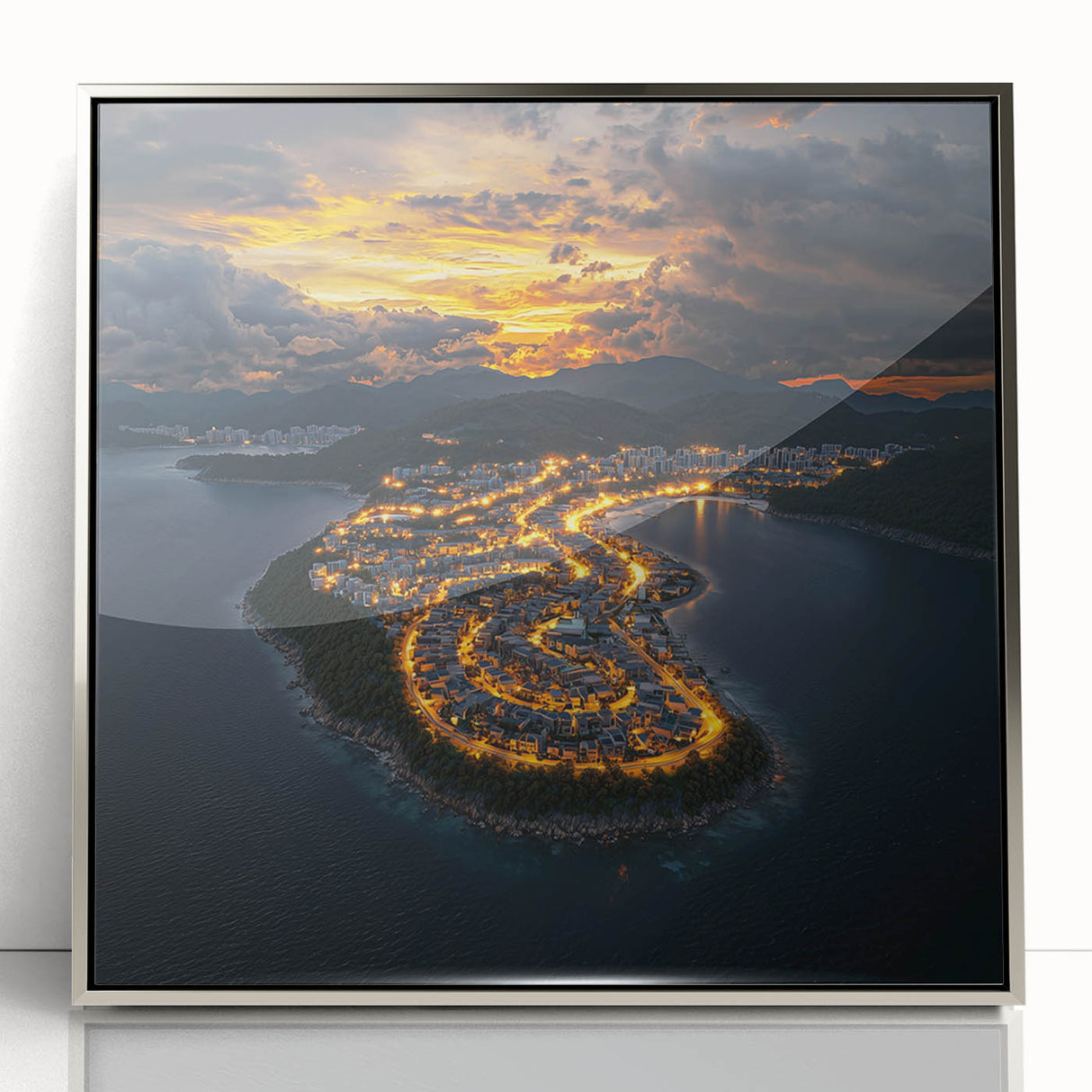 Framed acrylic landscape artwork depicting dramatic cliffs and serene seascape, featuring silver accents in a front view, ideal for modern home decor.