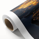 Vibrant rolled canvas artwork depicting a dramatic cliff landscape with rich colors and intricate details, perfect for home decor and artistic display.