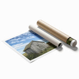 Rolled landscape canvas print showcasing a serene barn scene with vibrant colors and intricate details, securely packaged in a protective tube for delivery.