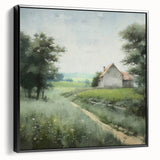 Framed canvas wall art depicting a serene countryside landscape with vibrant green fields and a clear blue sky, featuring a sleek black frame for modern decor.