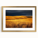 Golden-framed landscape artwork depicting a serene countryside scene with lush green fields and a clear blue sky, elegantly matted for a refined presentation.