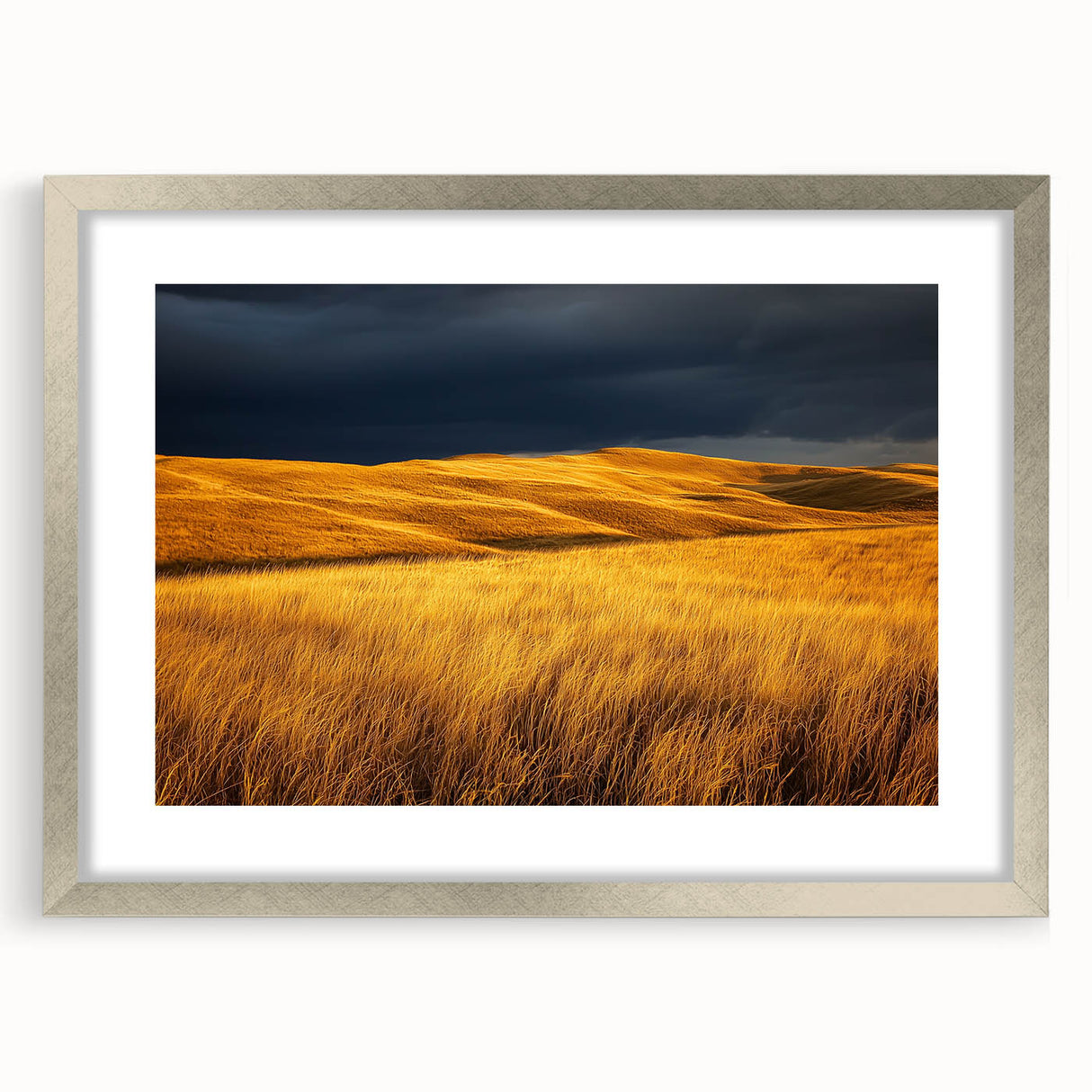 Framed silver landscape artwork showcasing a serene countryside scene, featuring lush green fields and a clear blue sky, perfect for home decor.