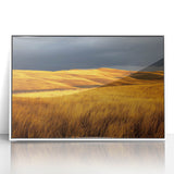 Framed acrylic artwork depicting a serene countryside landscape with vibrant greens and soft blue skies, set in a sleek white frame, perfect for home decor.