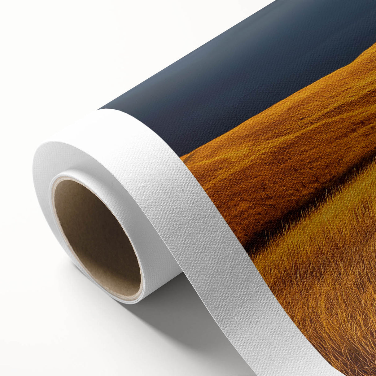 Vibrant rolled canvas artwork depicting a serene countryside landscape with rolling hills and a clear blue sky, beautifully packaged in a protective cardboard tube.