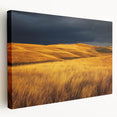 Stretched canvas artwork depicting a serene countryside landscape with rolling hills and a vibrant sunset, showcasing rich greens and warm oranges. Perfect for home decor.