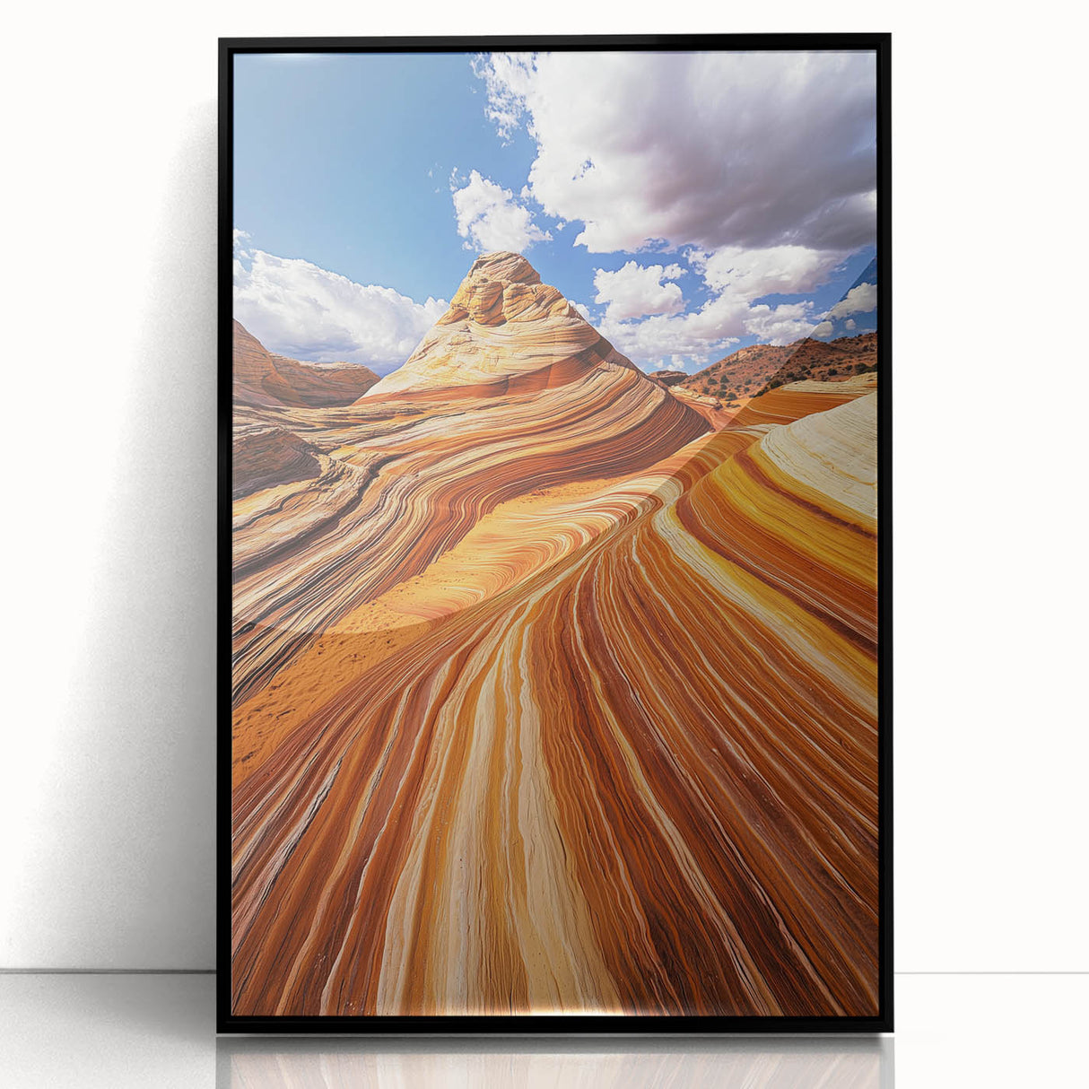 Framed acrylic artwork showcasing a stunning desert landscape in vibrant oranges and browns, ideal for modern home decor. The piece features a sleek black frame, enhancing its visual appeal.