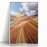 Framed acrylic landscape art depicting a serene desert scene with warm tones of orange and beige, set against a white frame, ideal for modern home decor.