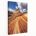 Stretched canvas artwork depicting a vibrant desert landscape in warm tones, showcasing rolling dunes and a clear blue sky, perfect for home decor.