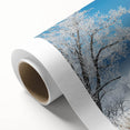 Vibrant rolled canvas showcasing a picturesque landscape of lush green fields under a bright blue sky, perfect for home decor or art enthusiasts.