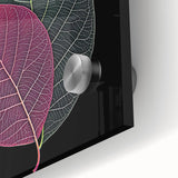 Large abstract wall art featuring close-up of leaves in green and yellow tones on acrylic glass.