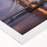Art deco poster of London scenery on rolled canvas, featuring muted earth tones, ideal for dining room wall art.