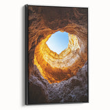 Framed black canvas artwork depicting a serene landscape with caves, showcasing intricate details and colors that enhance any modern decor. Perfect for nature enthusiasts.
