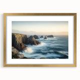 Framed landscape artwork featuring majestic cliffs under a blue sky, accented with a gold mat. Ideal for enhancing any home decor with natural beauty.