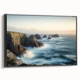 Framed black canvas art showcasing a serene landscape with dramatic cliffs under a vibrant sunset, perfect for home decor or office ambiance.