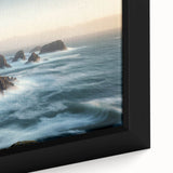 Framed canvas art showcasing a vibrant landscape with dramatic cliffs and a serene sky, perfect for adding color and depth to any room's decor.