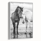 Framed canvas artwork showcasing a whimsical design of 50 colorful animals, displayed in a white frame, ideal for children's room decor or playful art collections.
