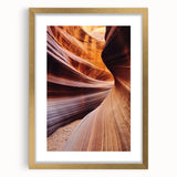 Landscape art print featuring a scenic canyon view framed in gold, accentuated with a white mat, ideal for enhancing home decor and adding elegance to any room.