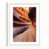 Framed landscape artwork depicting vibrant canyons with a white mat, ideal for home decor. Perfect for enhancing living spaces and art collections.