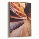 Framed canvas artwork depicting a stunning landscape of canyons, highlighted with a gold frame, showcasing intricate detail and vibrant colors, perfect for home decor.