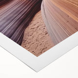 Vibrant rolled canvas featuring a stunning landscape of canyons at sunset, showcasing rich orange and purple hues, perfect for home decor or art enthusiasts.