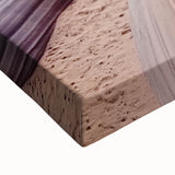 Close-up view of a stretched canvas showcasing a vibrant landscape of canyons, highlighting rich colors and intricate details, ideal for home décor and art enthusiasts.