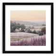 Black-framed landscape wall art showcasing a serene countryside scene with vibrant green fields and a clear blue sky, perfect for enhancing home decor aesthetics.