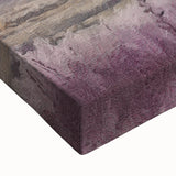 Close-up of a stretched canvas wall art depicting a serene countryside landscape with vibrant green fields and a blue sky, perfect for nature lovers' decor.