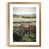 Elegant gold-framed landscape art print showcasing a serene countryside scene with vibrant green fields and a clear blue sky, perfect for home decor.