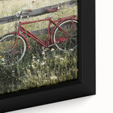 Close-up of a framed canvas artwork depicting a serene countryside landscape, showcasing lush green fields and a vibrant blue sky, ideal for home decor.