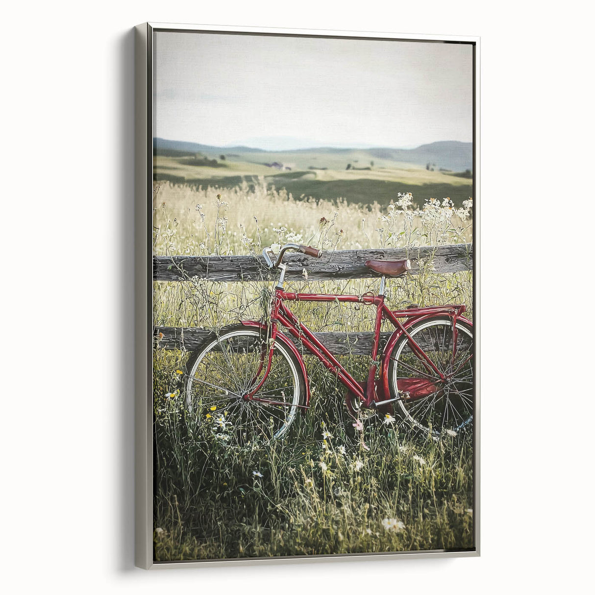Framed canvas artwork showcasing a picturesque countryside landscape, featuring vibrant colors and detailed scenery, displayed in a sleek silver frame for an elegant touch.
