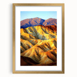 Framed desert landscape artwork with a gold mat, showcasing vibrant colors and intricate details, ideal for home decor and enhancing interior aesthetics.
