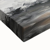 Close-up of a stretched canvas artwork depicting a vibrant, abstract landscape design with rich colors and intricate details, perfect for modern home decor.