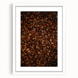 Abstract art print depicting autumnal trees in orange and yellow, framed in white, suitable for dining room decor.