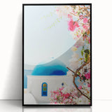 Large abstract wall art featuring swirling blue and orange patterns on a framed acrylic.