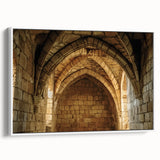 Framed canvas artwork depicting a picturesque landscape with a majestic castle, showcasing vibrant colors and intricate details, set against a white frame for a modern aesthetic.