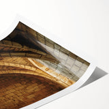 Rolled print showcasing a vibrant landscape featuring a medieval castle surrounded by lush greenery, elegantly packaged in a protective cardboard tube for easy display.