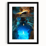 Framed landscape artwork showcasing a serene cave scene, featuring a black mat and sleek frame, perfect for home decor or office ambiance, enhancing any space with nature's beauty.