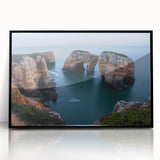 Framed acrylic artwork depicting dramatic cliffs with lush greenery, showcased in a sleek black frame. Perfect for modern home decor, enhancing any living space.